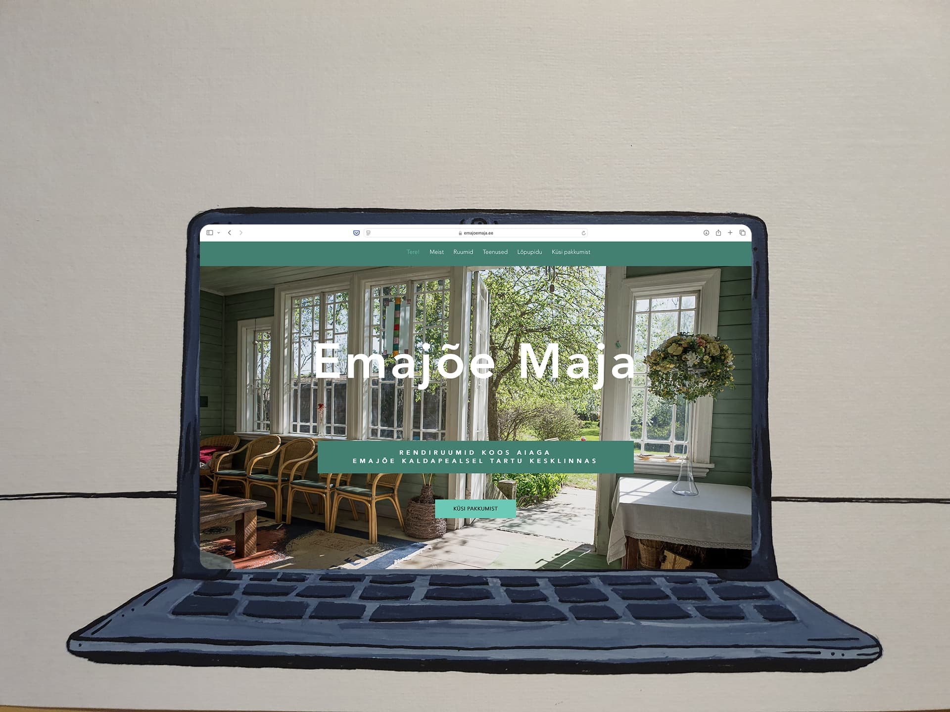 Emajõe Maja kodulehe eelvaade sülearvutil